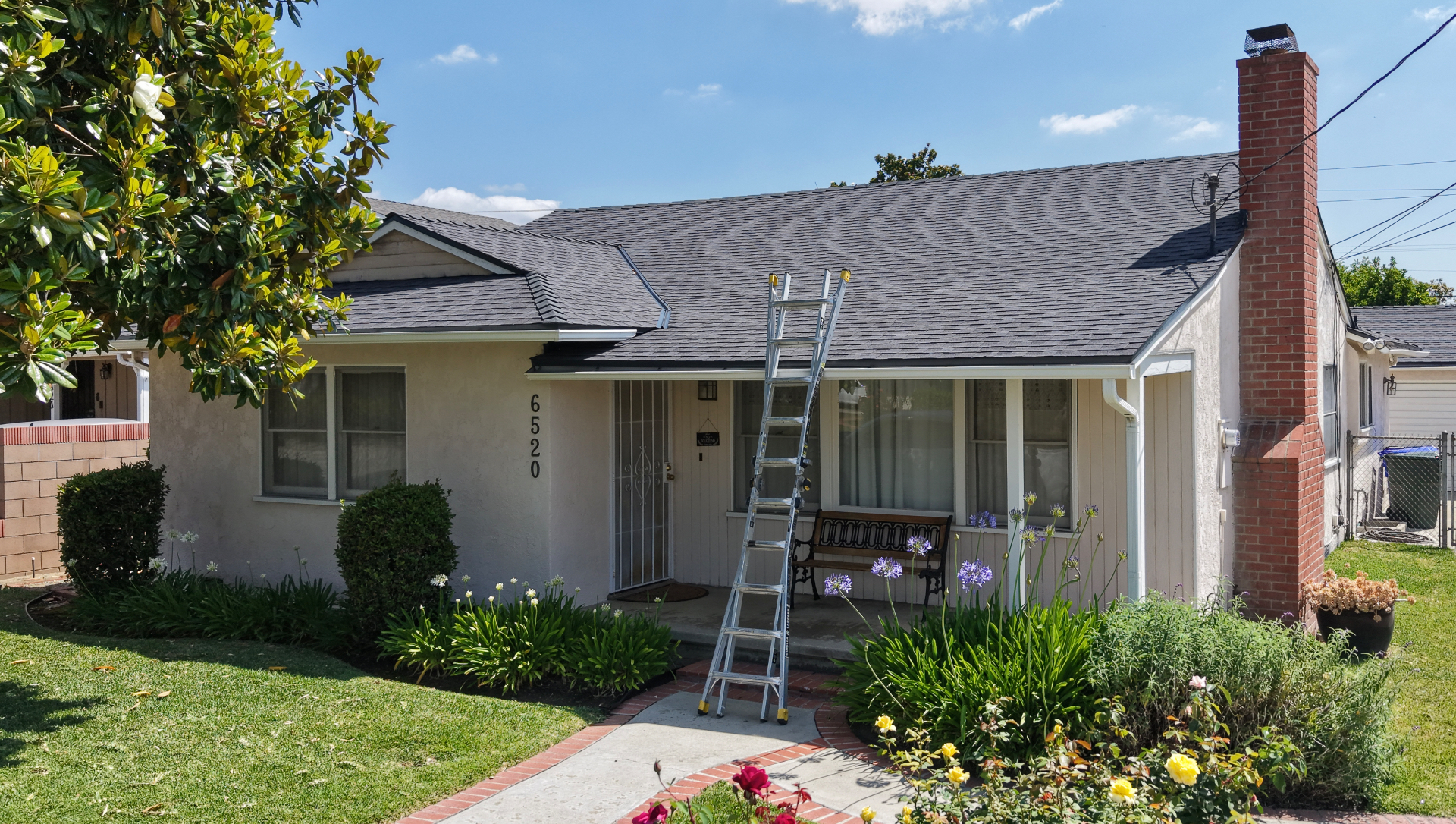 Finished grey shingle roof on a single-story home
