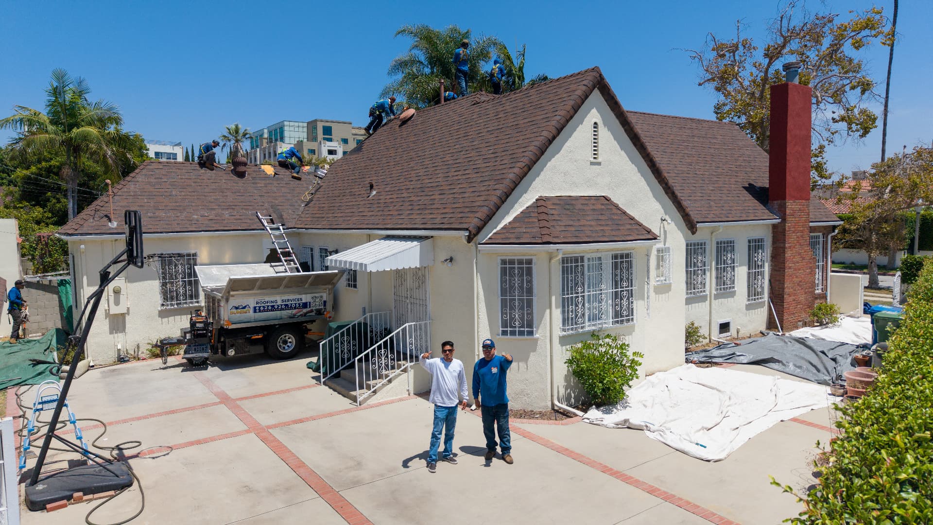 DT Roofing crew and owners on a Los Angeles job site