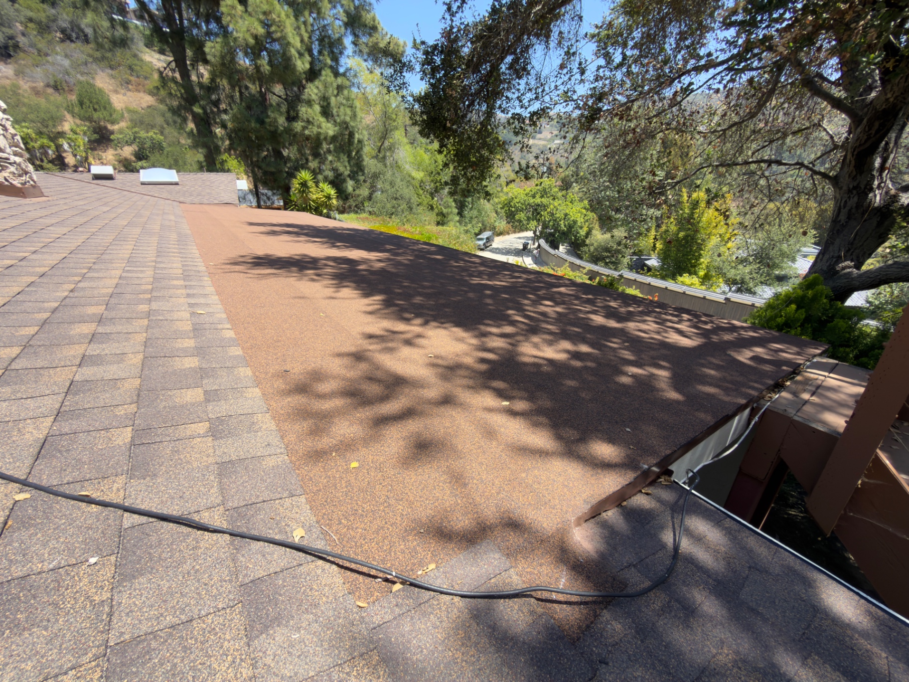 Completed torch-down roofing system after repair