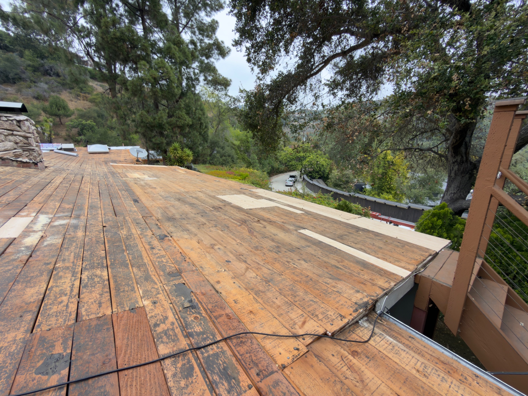 Torch-down roof stripped down to the deck during repair